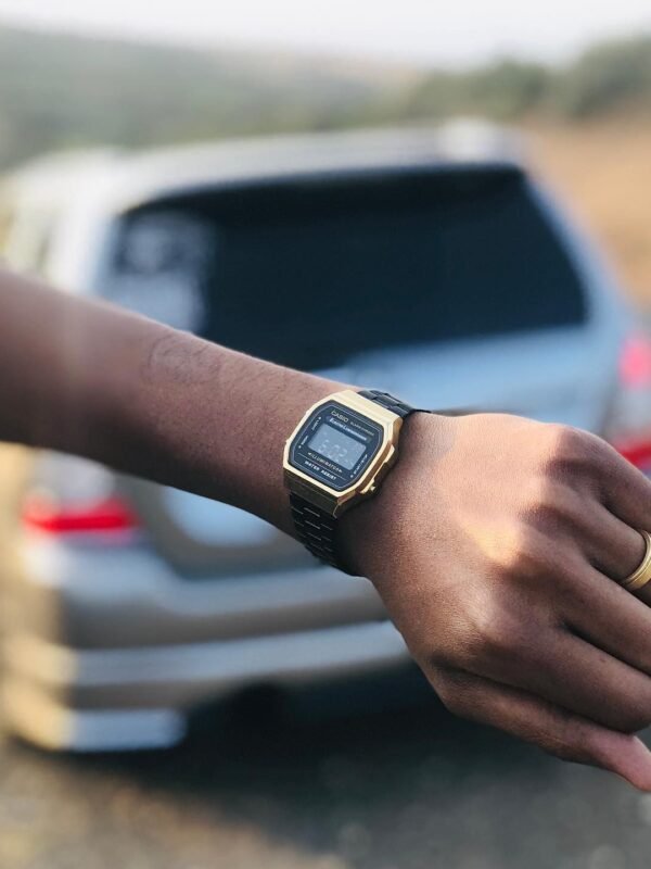 Black strap gold dial A168